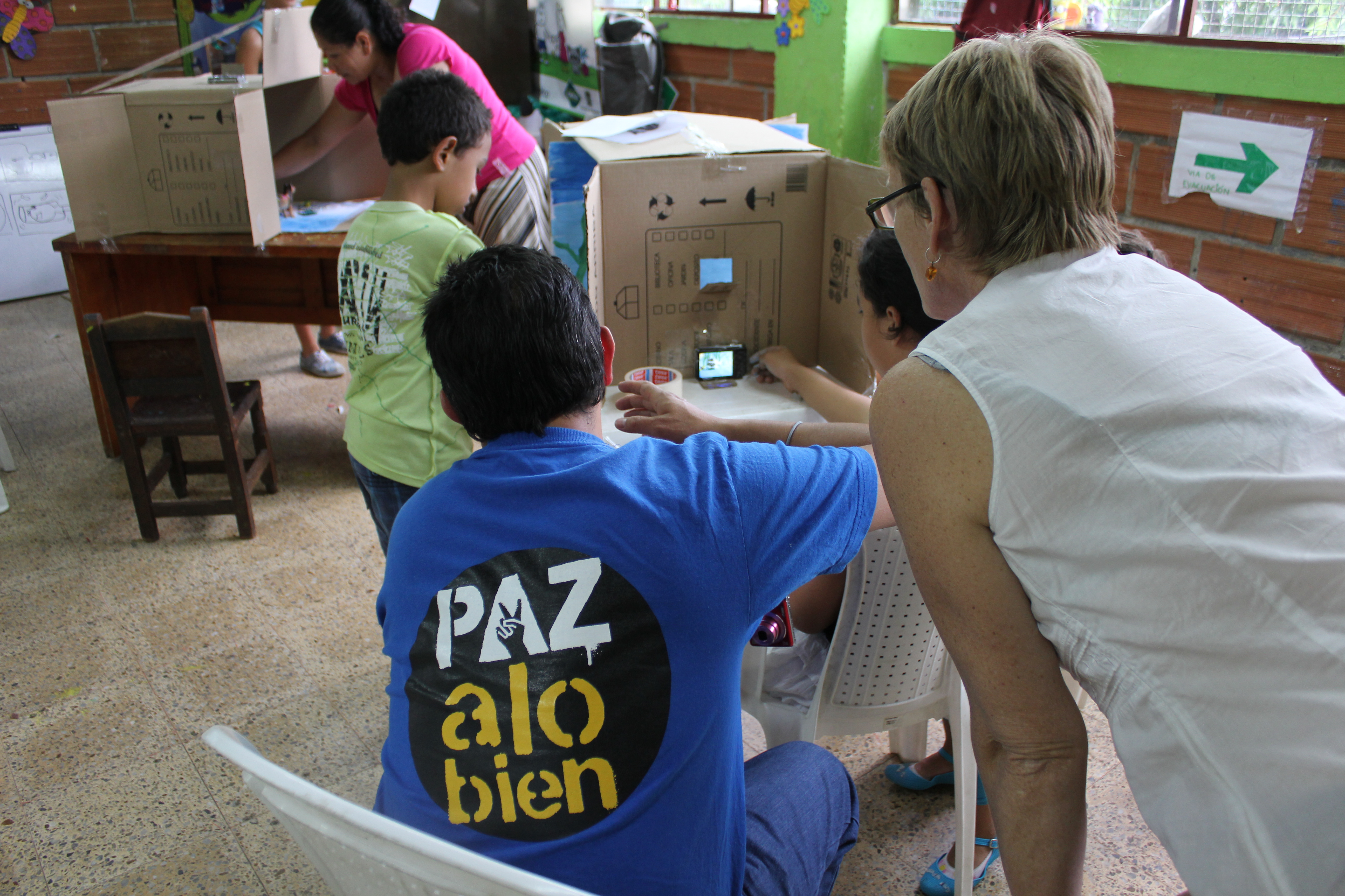 A teacher with children.